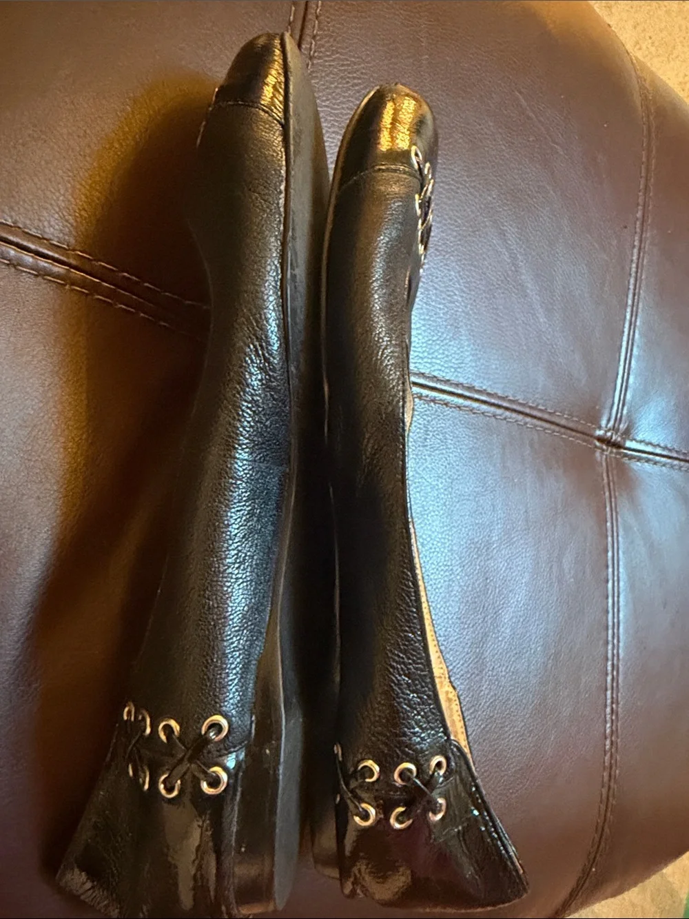 Micheal Kors black flats with grommet /leather detail sz 9.5